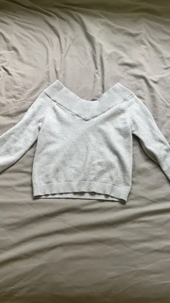 Pull épaule dénudé