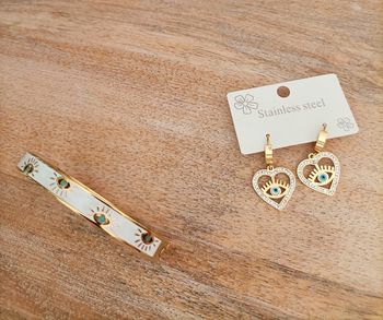 Ensemble de bijoux en acier doré'Oeil du Diable'