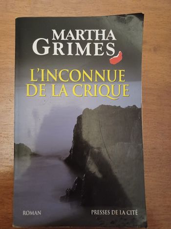Roman "l'inconnue de la crique "