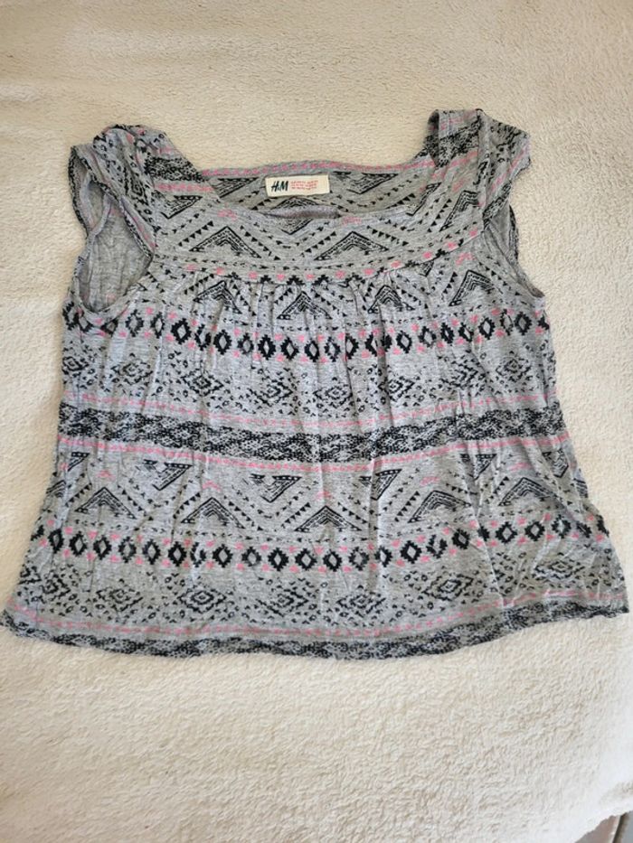 Très beau t shirt.