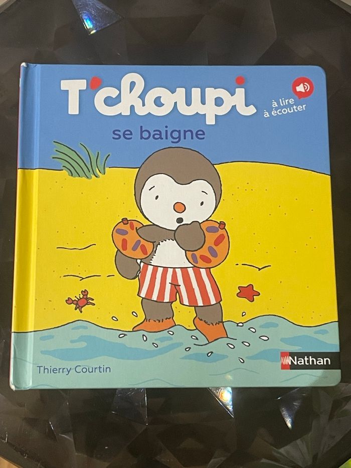 Livre tchoupi se baigne
