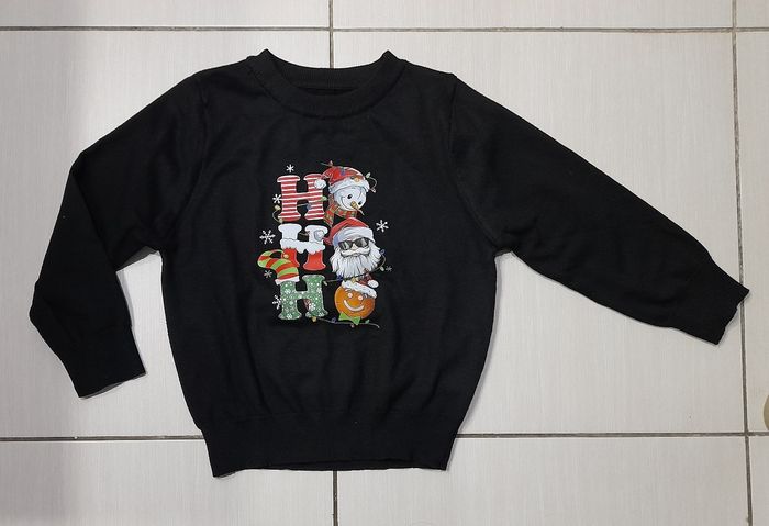 Pull de Noël 6 ans
Flocage légèrement craquelé