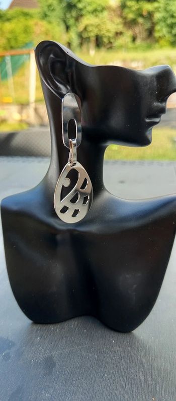 Boucles d'oreilles ovales a motifs femme