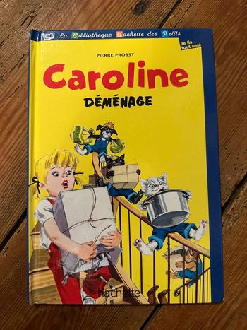Livre rare Caroline déménage bleu album bibliothèque Hachette des petits je lis tout seul