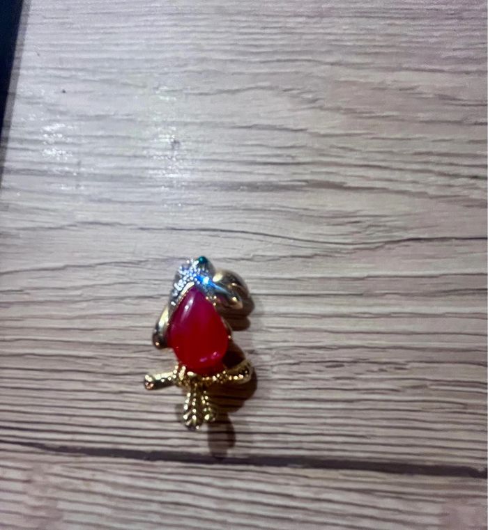 Broche toucan yeux verts