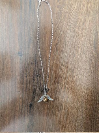 Collier fantaisie Harry Potter vif d'or