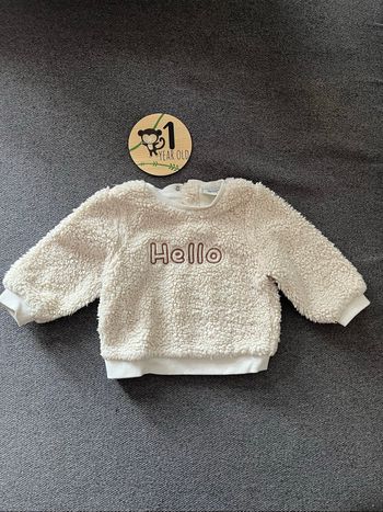 Pull bébé tape à l’œil