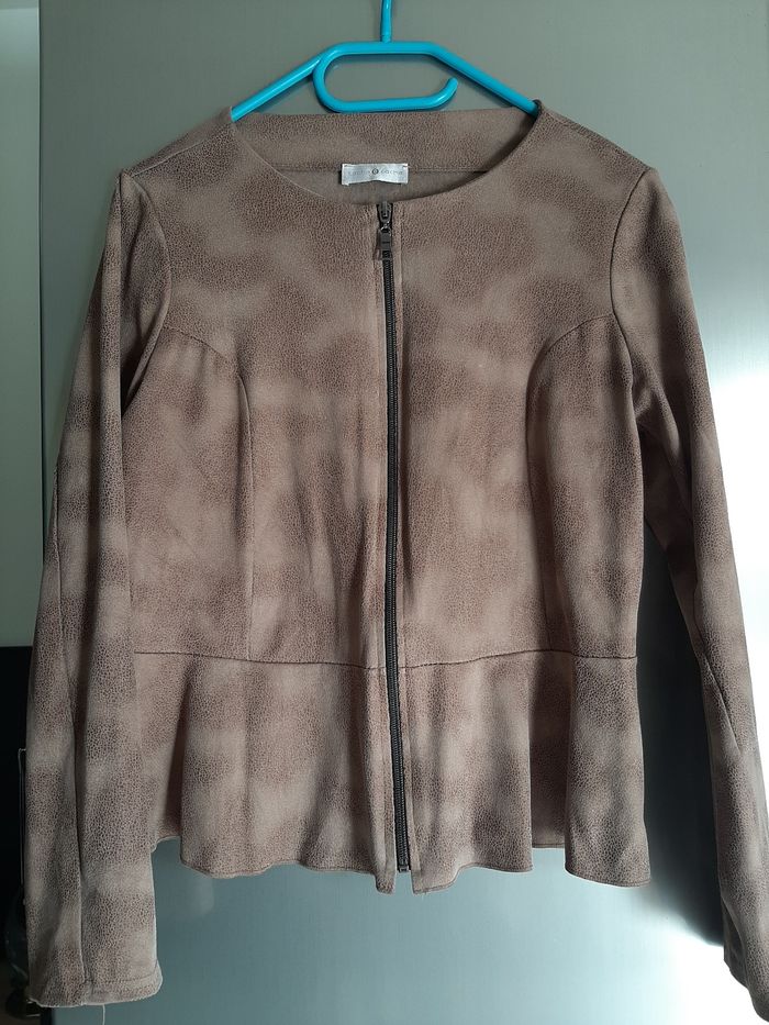Veste beige aspect peau de pêche