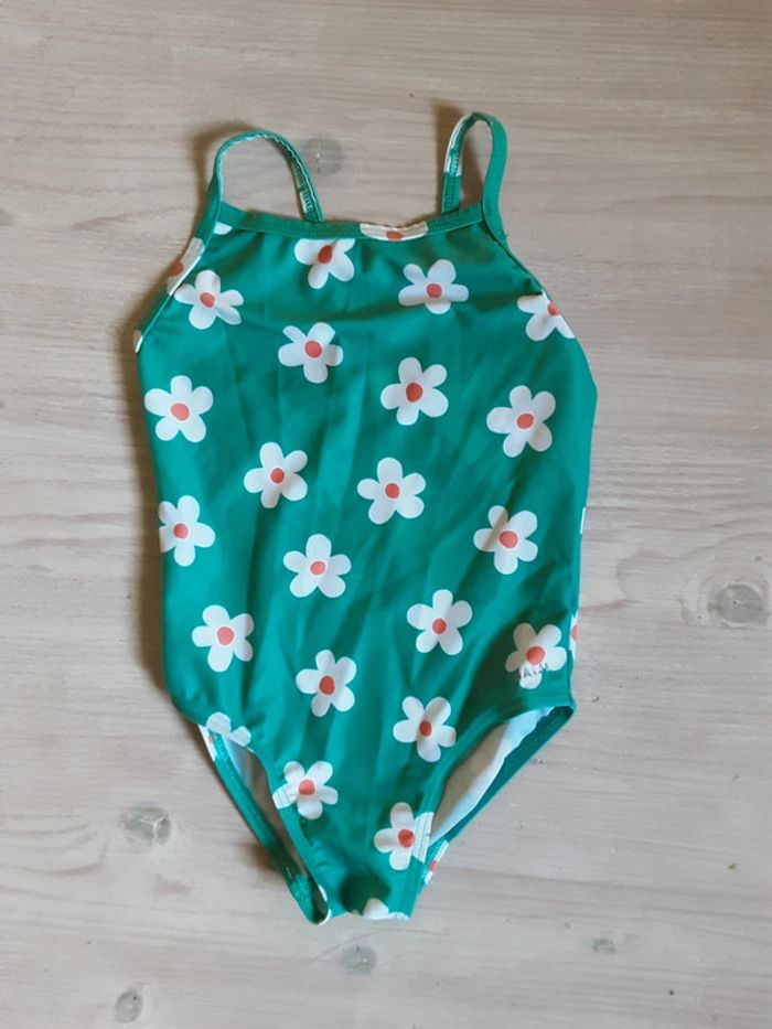 Maillot de bain fleurs comme neuf T. 2 ans