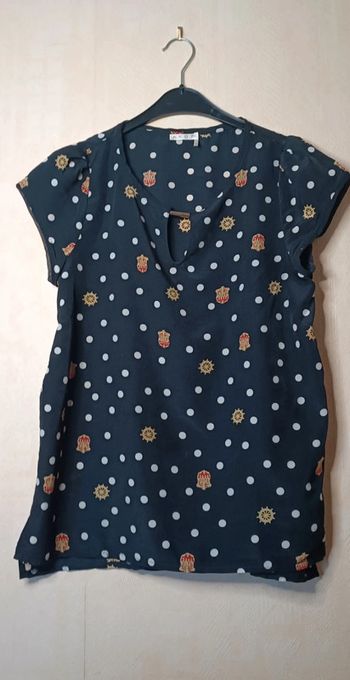 Blouse noire à pois blanc