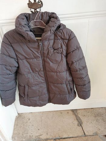 Parka fille DPAM 10 ans en  très bon état .