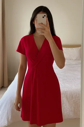 Robe en soie rose fuchsia drapée Les Petites Paris Taille 36