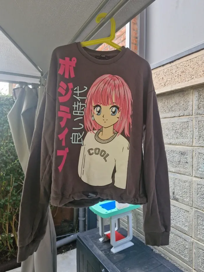 Pull gris • Manga - photo numéro 5