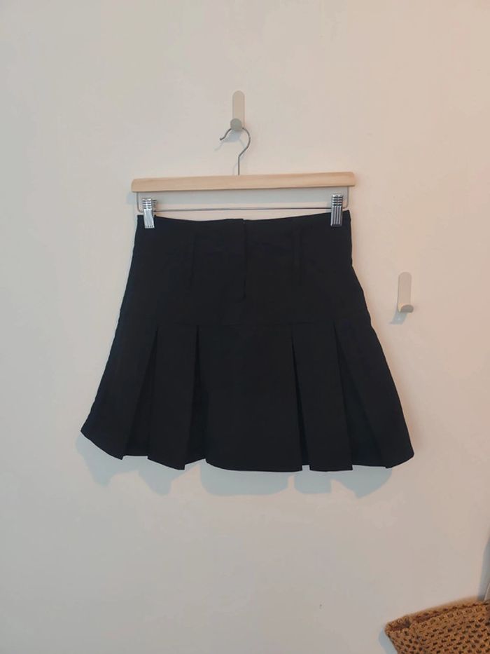 Jupe plissée noire écolière 34