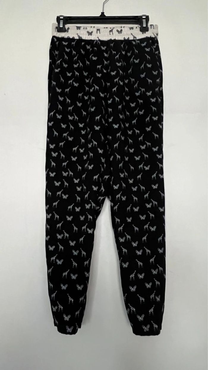 Pantalon fluide en parfait état taille 38 marella marque italienne acheté en boutique à Rome
