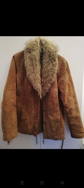 Veste avec col en fausse fourrure