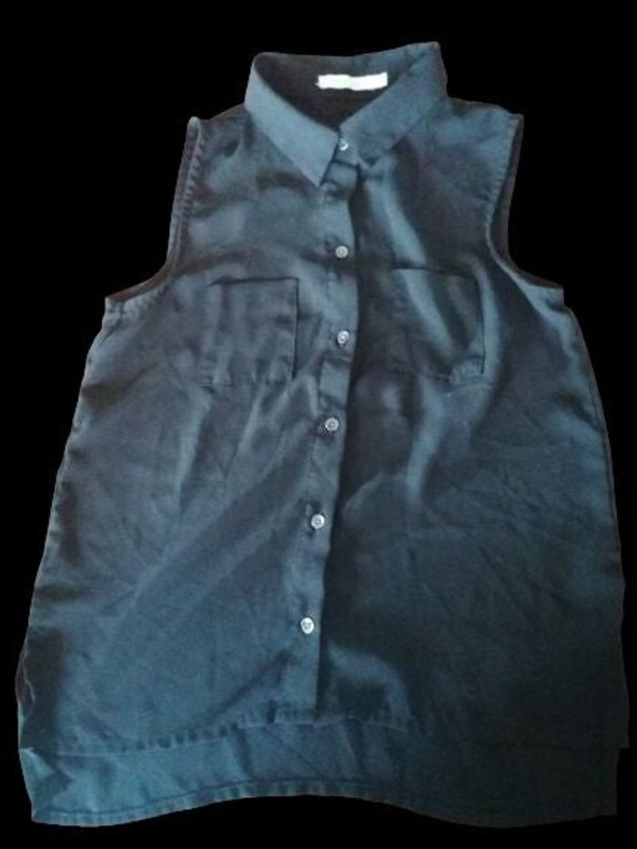 Chemise sans manche taille 12 ans