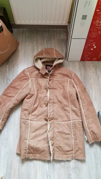 Manteau chaud type mouton retourné