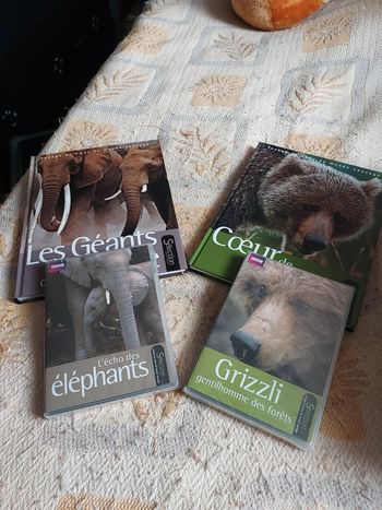 Magnifique lot de 2 livres avec les 2 dvd neuf