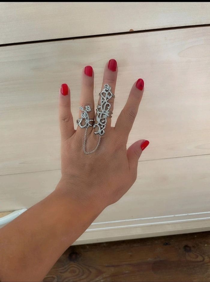 Magnifique double bague ajustable strass.