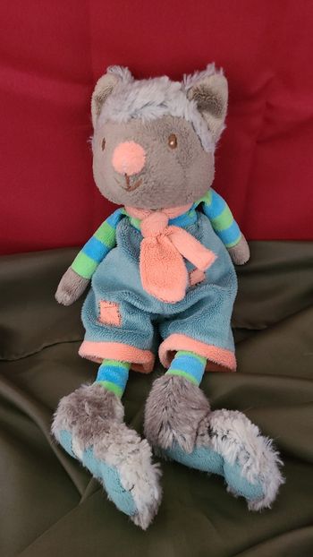 Peluche Wolfy loup BUKOWSKI gris salopette bleu vert 25 cm