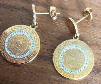 Boucles d’oreilles pendentif rond