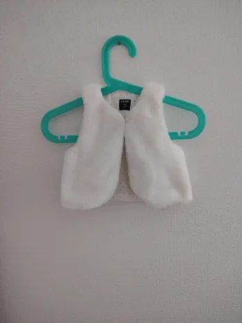 Gilet sans manches taille 3 mois neuf