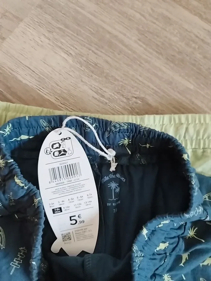 Lot de deux short 7-8 ans neuf - photo numéro 2