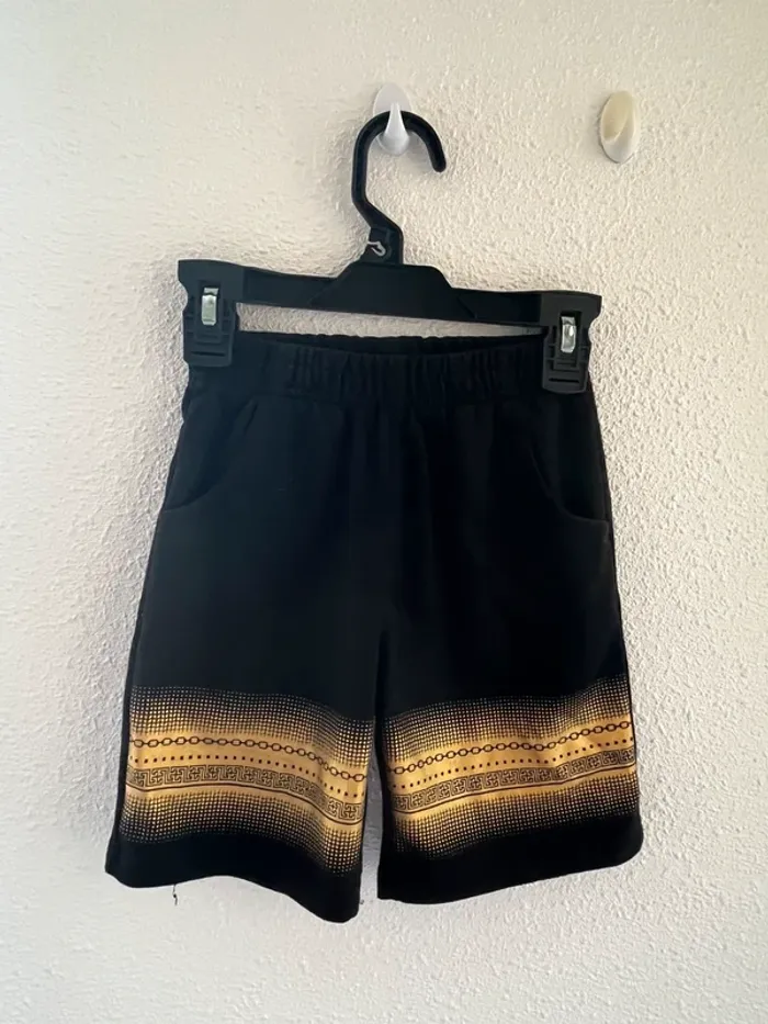 Short noire doré taille 4 ans 💫
