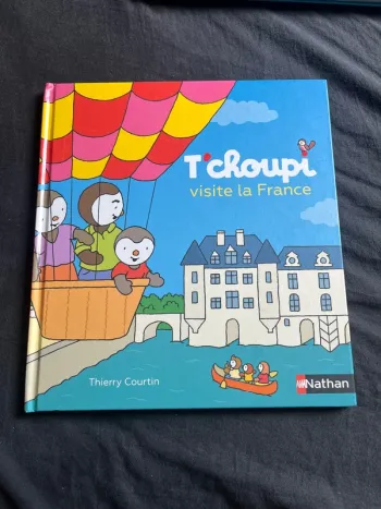 T’choupi visite la France