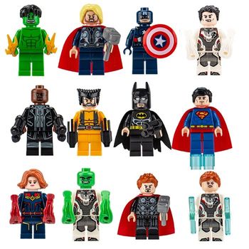 Lot de 12 figurines avengers marvel block superman wolverine etcc