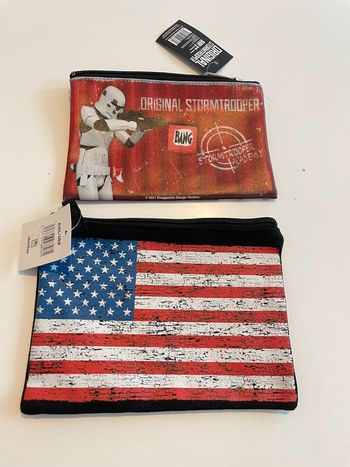 2 pochettes trousses USA et star wars