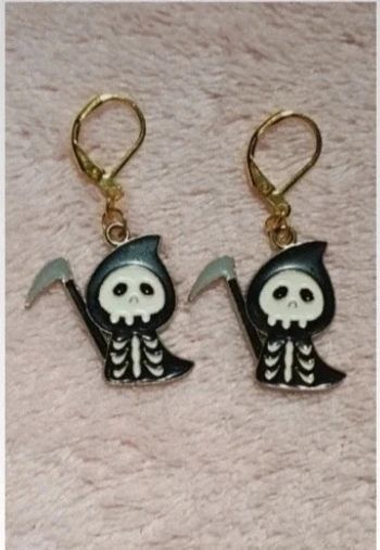 Boucles d'oreilles faucheuse