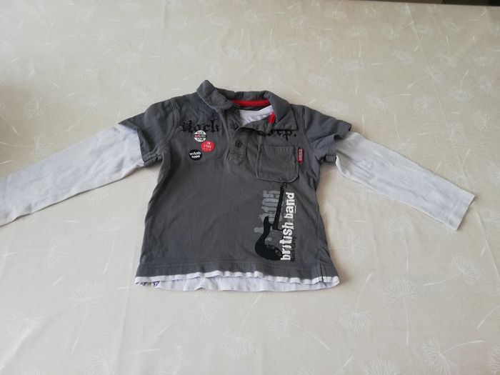 Polo manches longues gris/blanc 5 ans