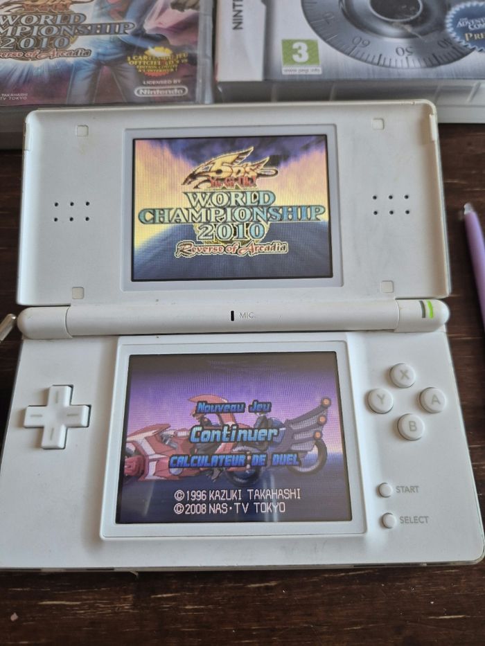Nintendo ds lite blanche et jeux - photo numéro 2