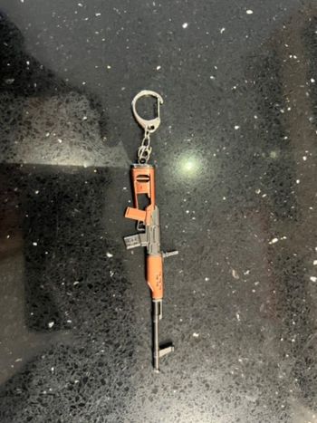 Porte clés fortnite arme