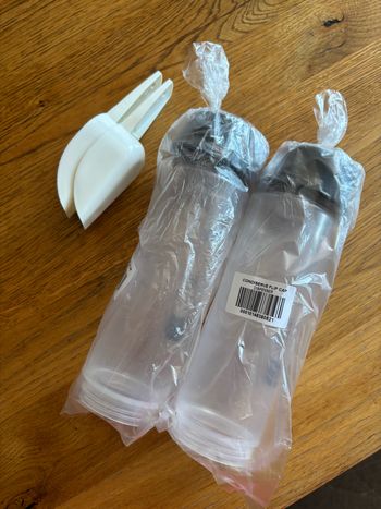 2 condiserves souples + 2 pelles Tupperware neuf