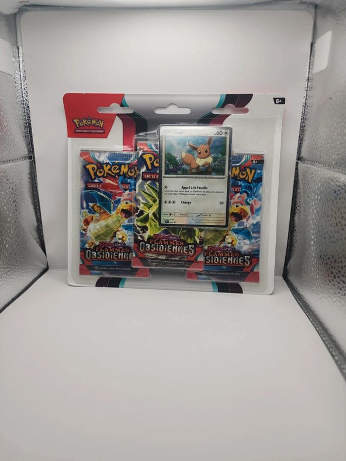 Pokemon Tripack Flammes Obsidiennes Évoli