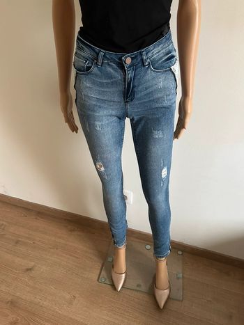 Jean bleu avec dentelle Naf Naf taille 34 excellent état