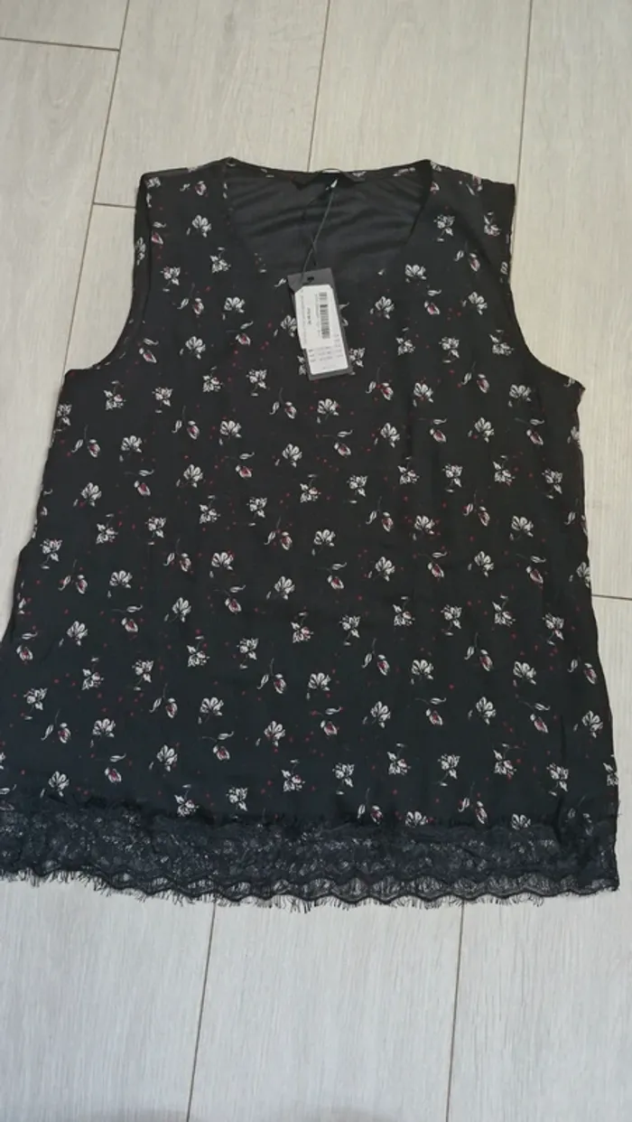 T shirt sans manches taille M neuf