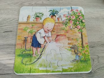 Puzzle 15 pièces Léo et Popi