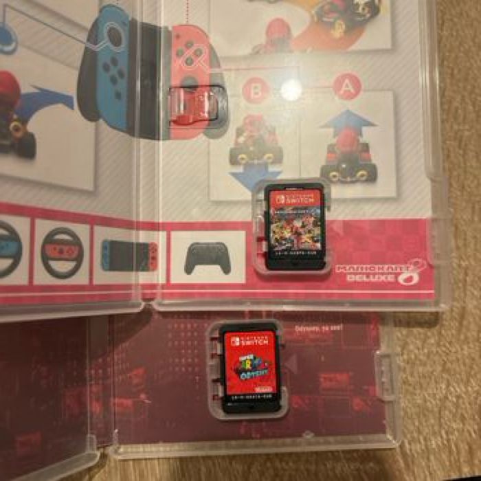 Lot jeux Mario odyssey et Mario kart switch - photo numéro 2