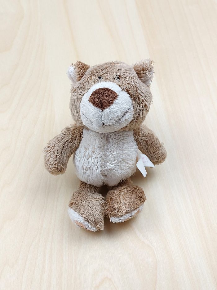 Petite peluche doudou ours marron ventre beige NICI 14 cm empreintes roses