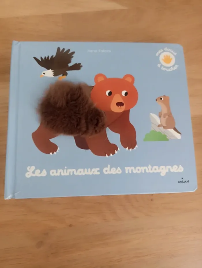Livre les animaux des montagnes à toucher.