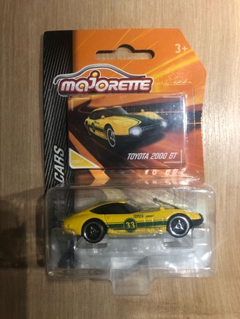 Miniature majorette racing Toyota GT2000
