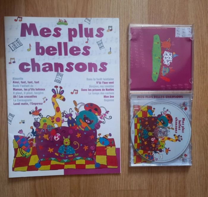 CD et sont livre de chansons - photo numéro 2