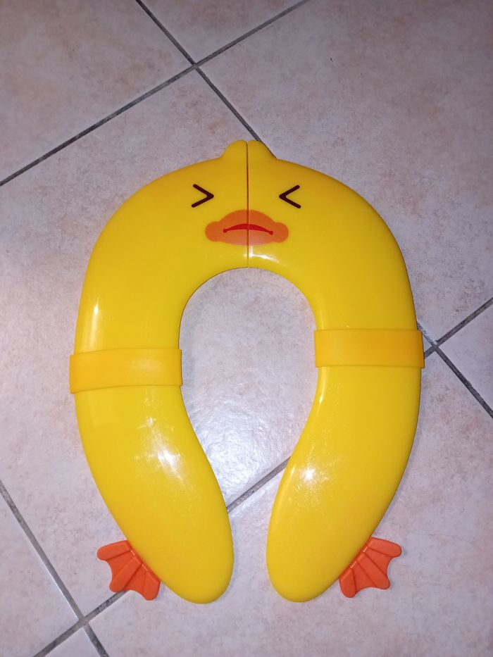 Réducteur de toilette canard