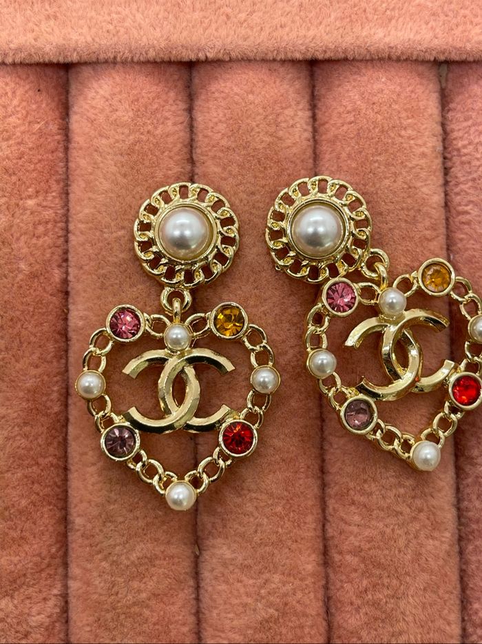 Boucles d’oreilles pendantes cœur dorées - photo numéro 7