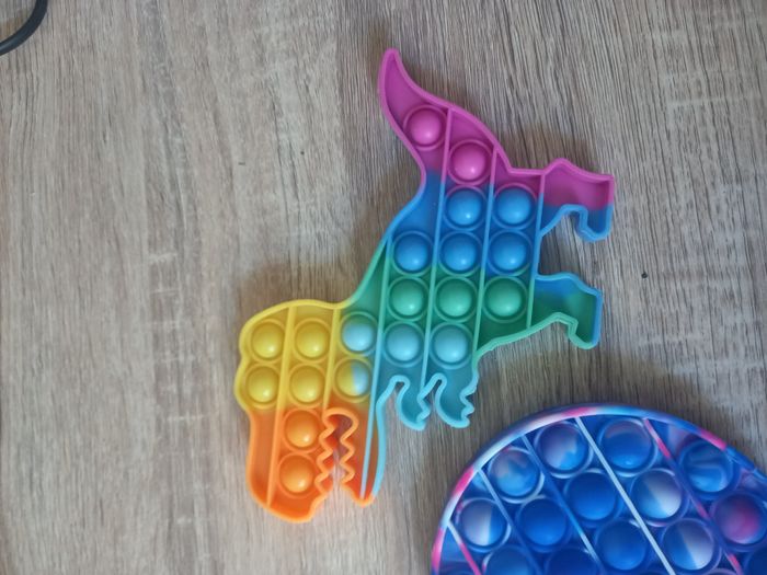 Jeu sensoriel / pop it / jeu anti stress en forme de dinosaure et de rond - photo numéro 5
