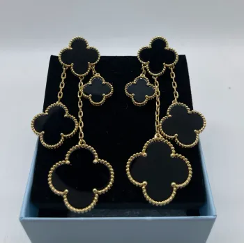 Boucles d’oreilles pendantes trèfles onyx nori